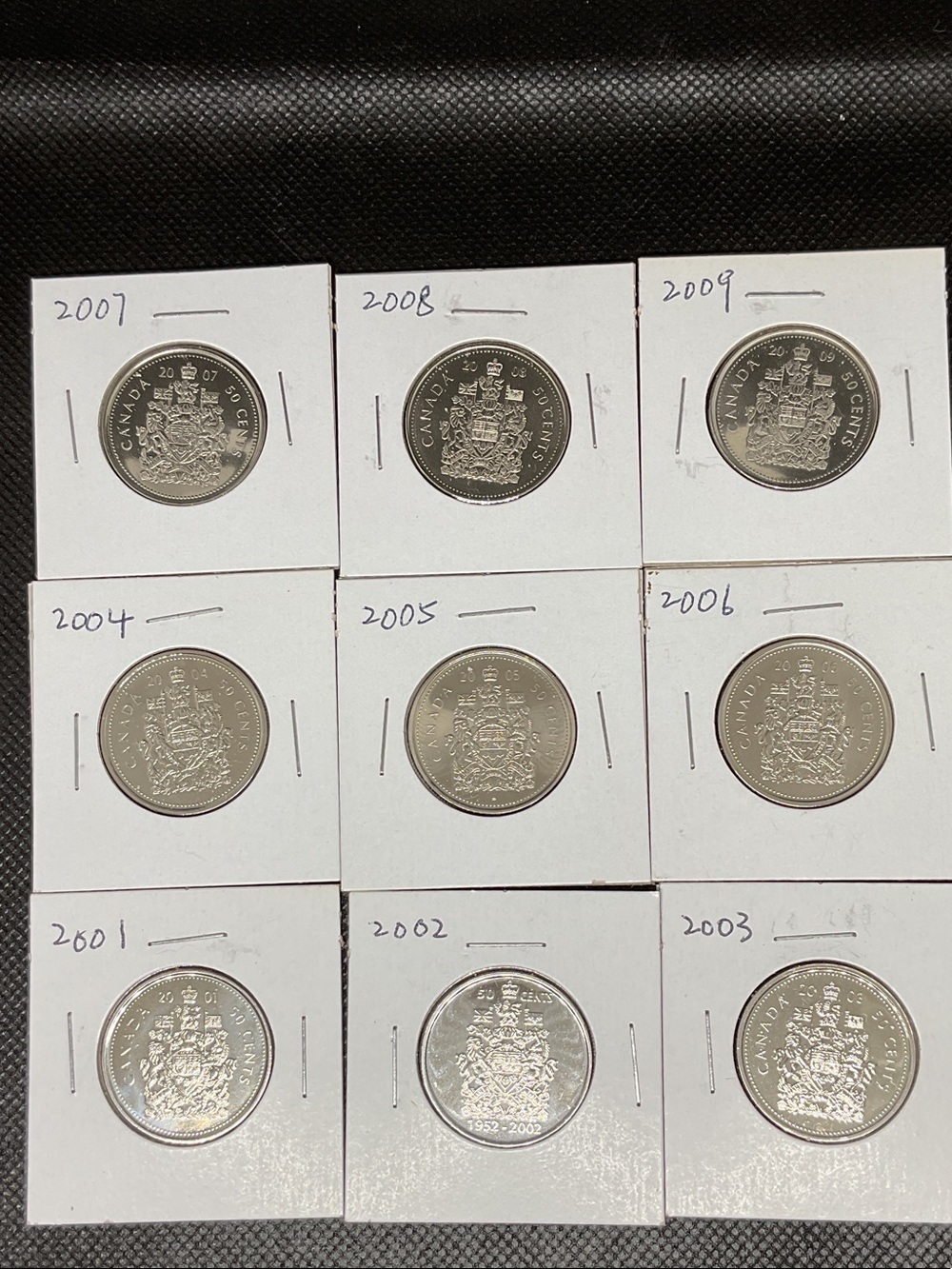 Lot of 9 Canadian 50 Cent Coins - 2001-2009 - Nickle Half Dollar